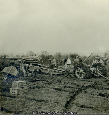 Artillerymen who between the Germans and the Mud are emplacing their Guns with difficulty (155mm Gun, 3d, Artillery, C1917, Soldiers, WW1)