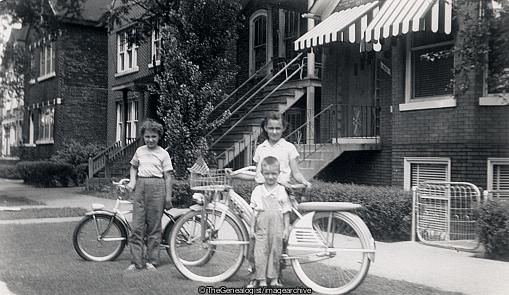 Kids on bikes with flag (bicycle, C1960, Flag, Suberb, U.S.A.)
