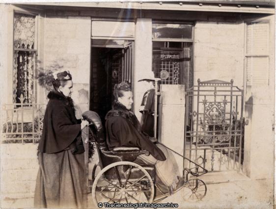 Lady in bath chair 1902 Mrs Saroce (1902, bath chair, England, Girl, hat, Lady)