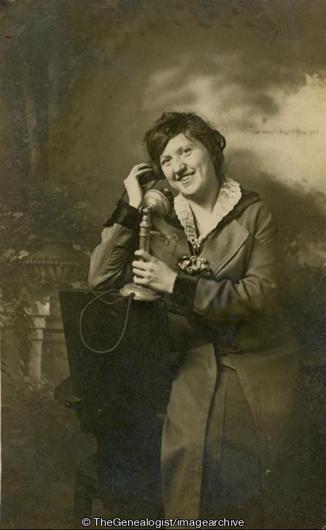 Lady on phone C1910 (C1910, Candlestick phone, Lady, Telephone)