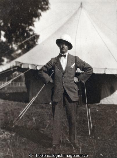 Man by tent with pith helmet (Camp, India, Pith Helmet)