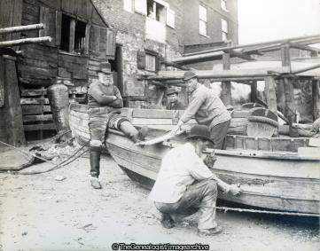 Repairing the Constance Scarborough (boat, bowler hat, Constance, Fishermen, Scarborough)