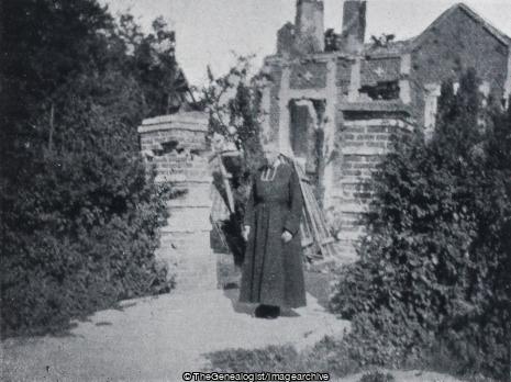 The Cure of Sec Bois at entrance to his house which was destroyed by the bombardment in the Spring of 1918 (1918, Curé, France, Hazebrouck, Nord-Pas de Calais, Ruins, Sec Bois, WW1)