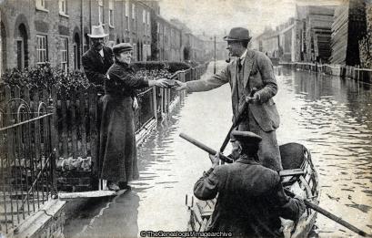 The Norwich Floods Lothian Street with Cushions woodyard 1912 (1912, England, Flood, Lothian Street, Norfolk, Norwich, Rowing Boat)