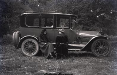 Vintage Car C1920 with two ladies (C1920, Car, England, Ladies, woodland)